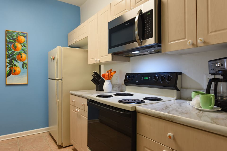Fully equipped kitchen with modern appliances, ready for your culinary creations.