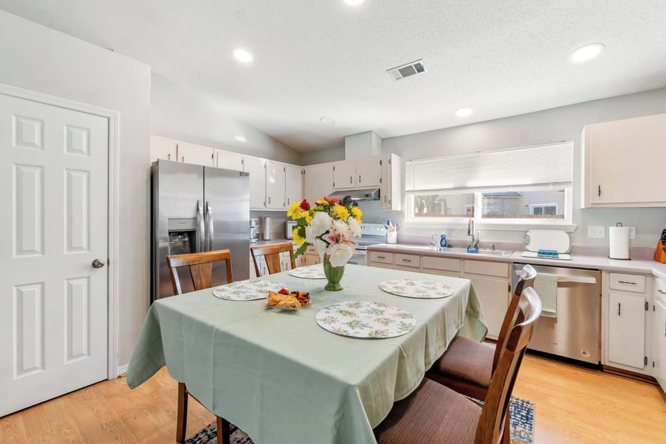 Sun-drenched dining area perfect for morning coffee.