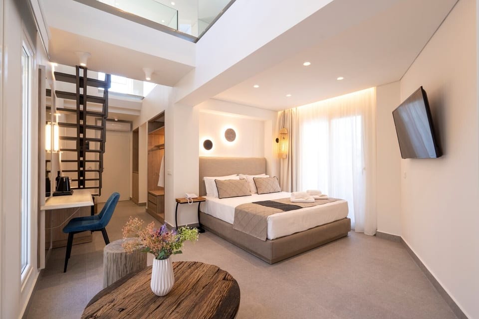 Executive Maisonette with Terrace Pool View | In-room safe, laptop workspace, soundproofing, iron/ironing board