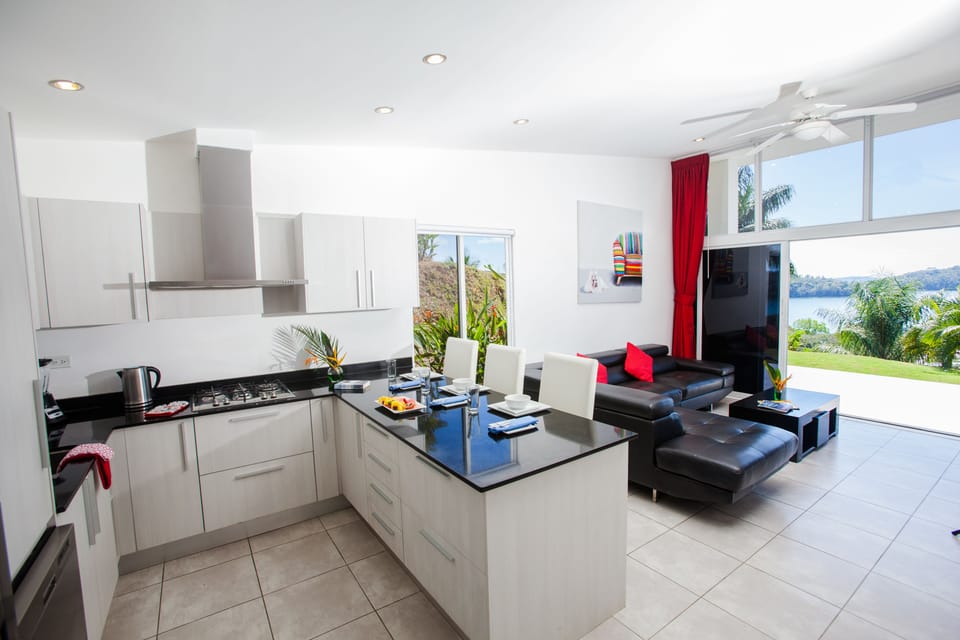 Villa, 2 Bedrooms, Kitchen, Ocean View | In-room safe, desk, laptop workspace, blackout drapes