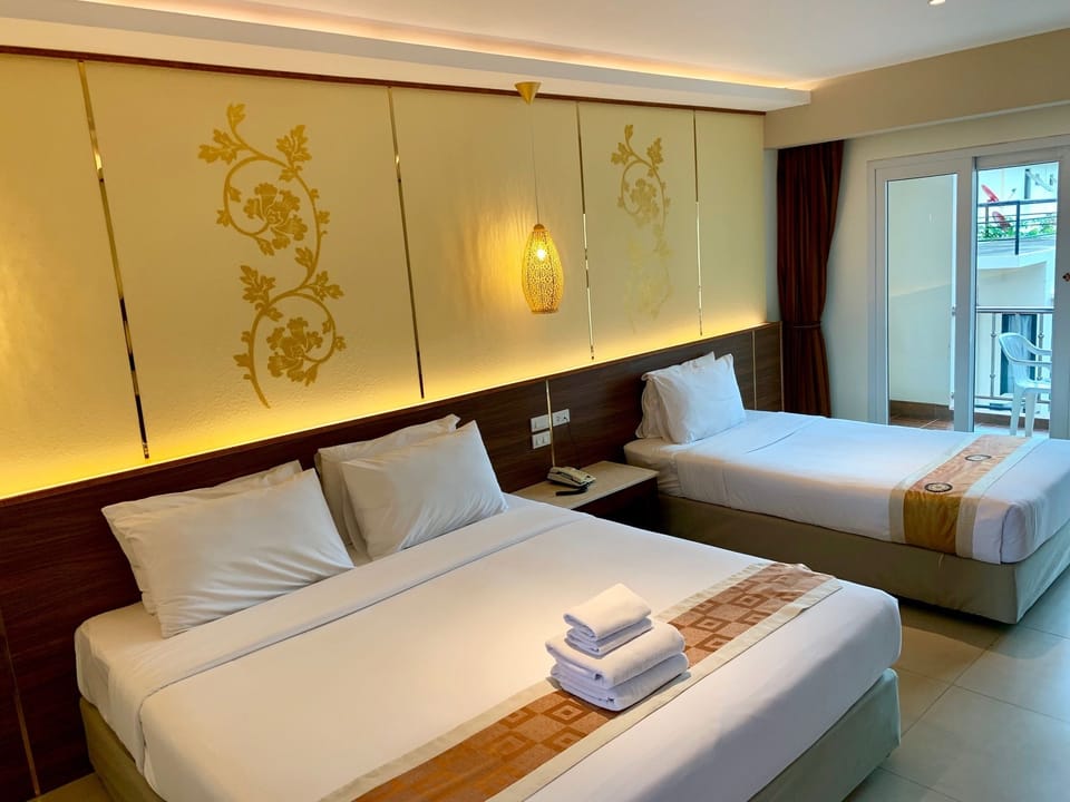 Family Room, Balcony | Minibar, in-room safe, blackout drapes, free WiFi