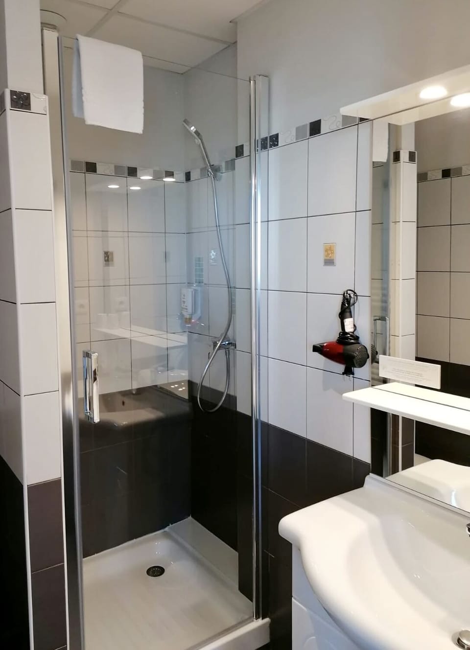 Shower, eco-friendly toiletries, hair dryer, towels