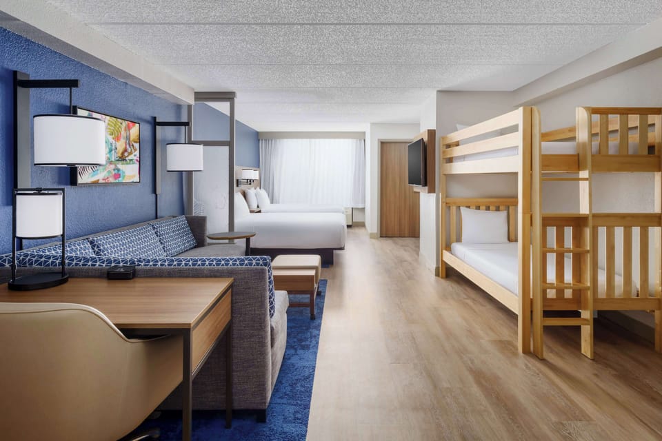 Room (2 Queen, Sofabed, and Bunk Beds) | Premium bedding, down comforters, in-room safe, desk