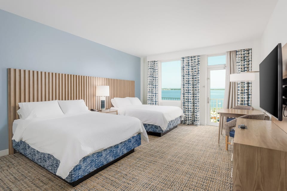 Premium bedding, down comforters, in-room safe, desk