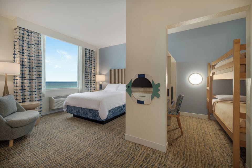 Premium bedding, down comforters, in-room safe, desk