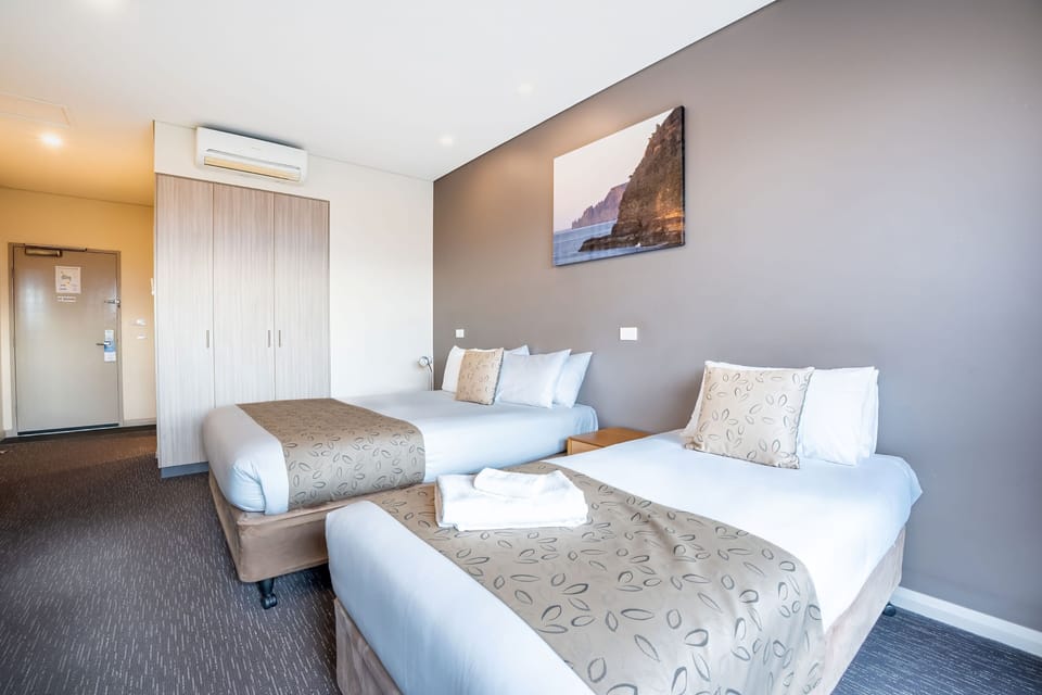 Superior Queen + Single Suite | Desk, laptop workspace, blackout drapes, iron/ironing board