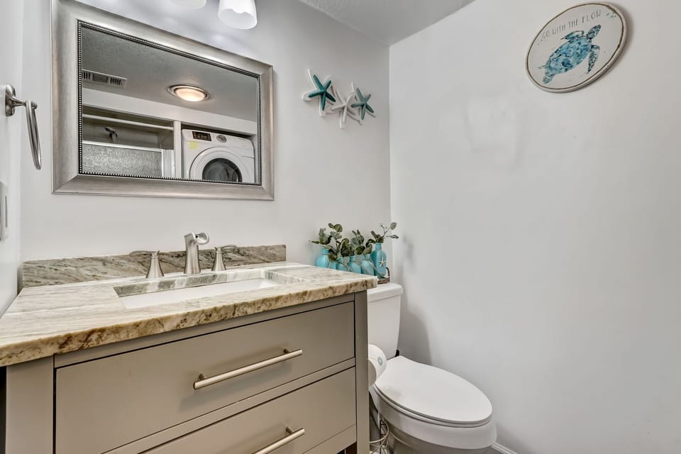 Downstairs Full Bathroom and Laundry Area