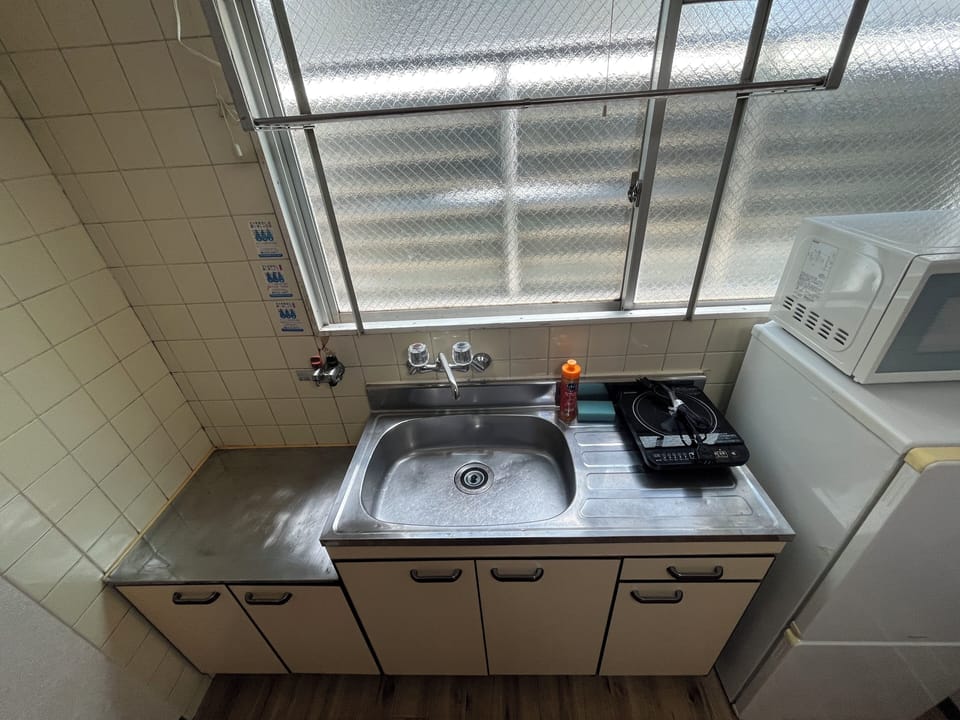 Apartment, 2 Bedrooms | Private kitchen | Fridge, microwave, stovetop, cookware/dishes/utensils