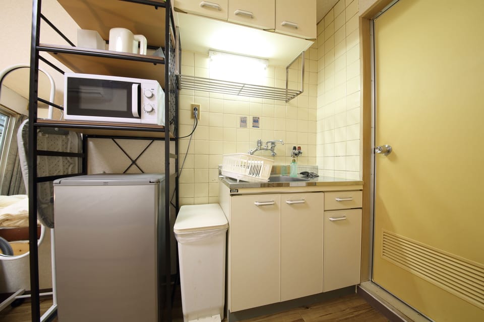 Apartment, 1 Bedroom | Private kitchen | Fridge, microwave, stovetop, electric kettle