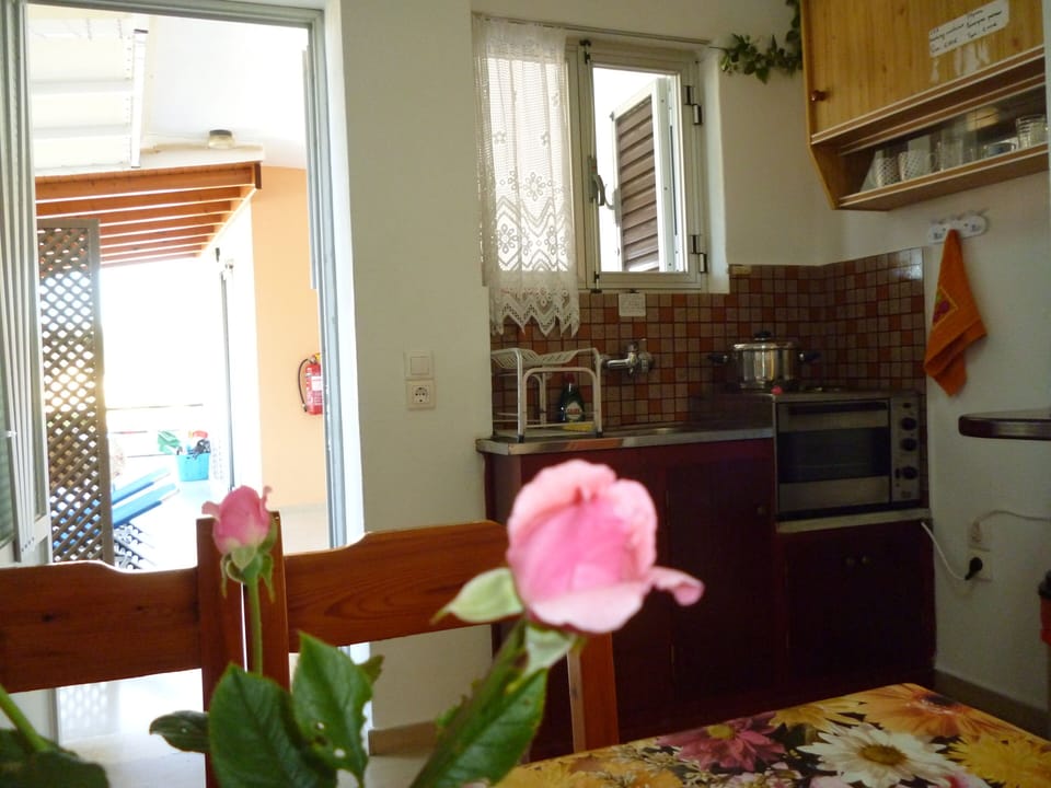 Apartment | Private kitchen | Fridge, stovetop, coffee/tea maker, electric kettle