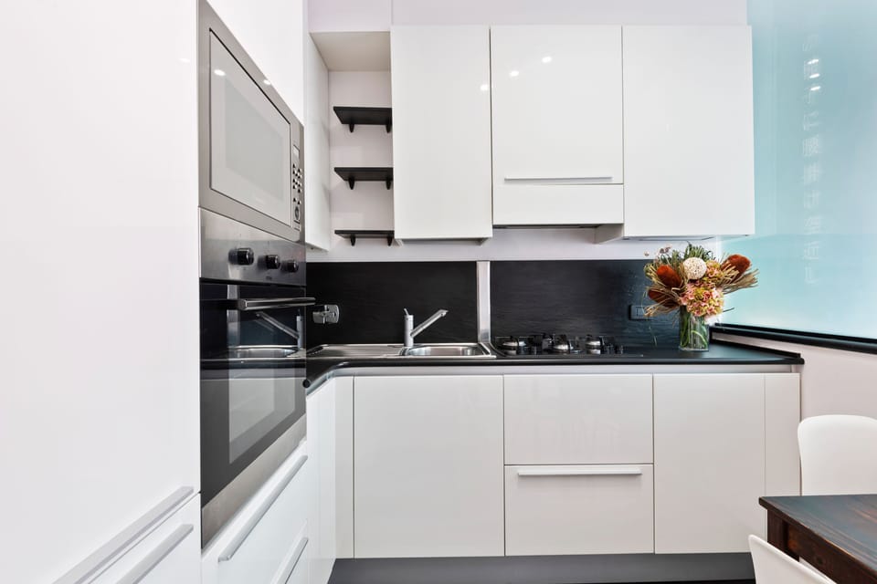 Studio, Non Smoking | Private kitchen | Full-size fridge, microwave, oven, stovetop