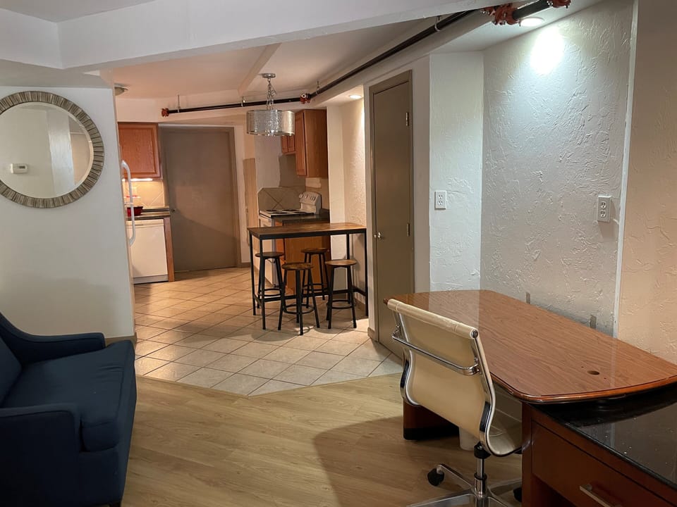 Standard Suite | Living area | 55-inch Smart TV with cable channels, TV, pay movies