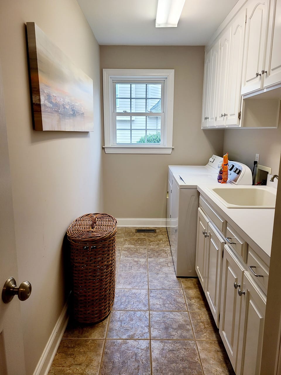 main floor
Laundry room with utility sink fully stocked