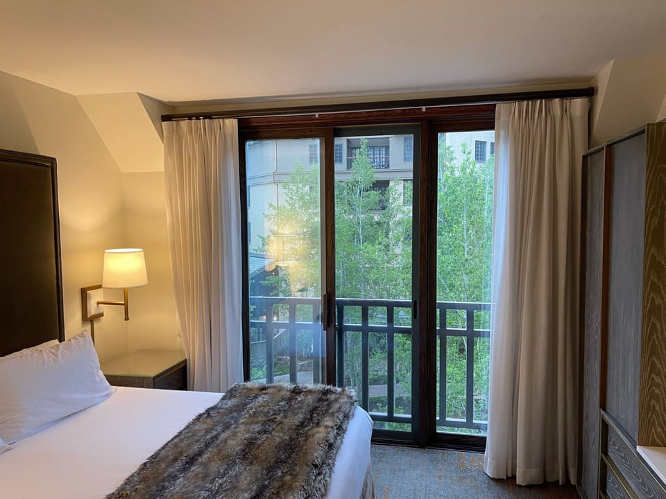 Sliding door opens to babbling beaver creek below