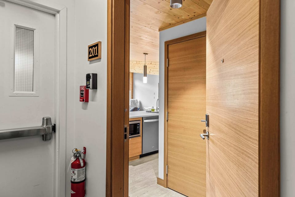 Step inside and be welcomed by a bright, fully equipped kitchen.