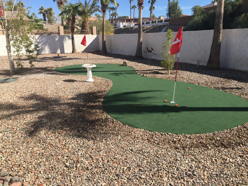 Pro putting green 35 x 15 with chip area youth clubs 3 