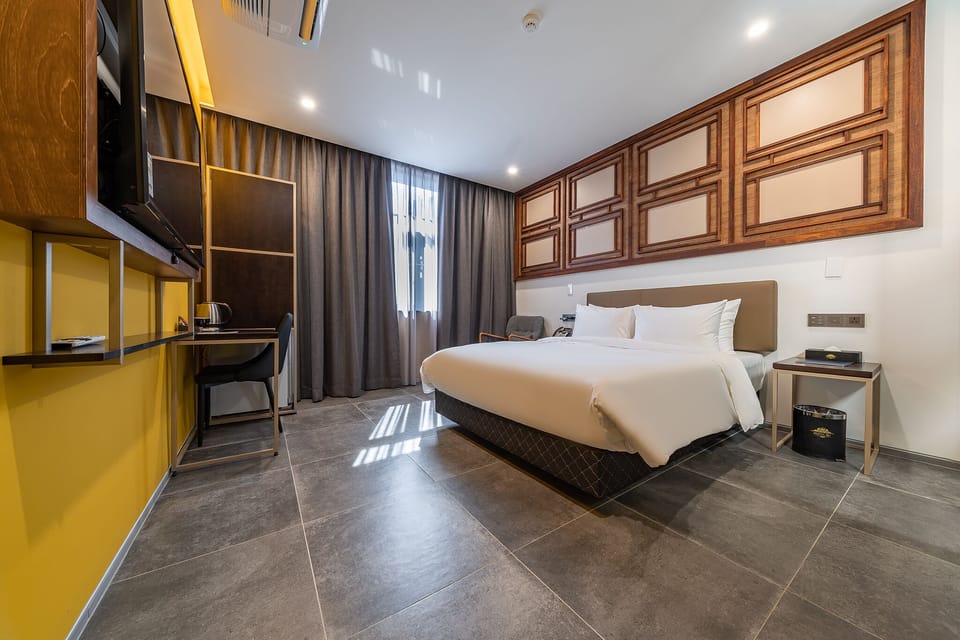 Deluxe Double Room | In-room safe, desk, laptop workspace, blackout drapes