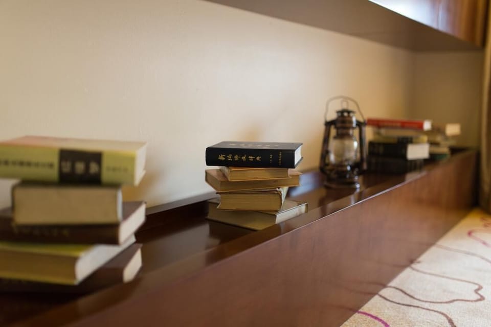 City Suite | Desk, blackout drapes, WiFi (free), individually decorated