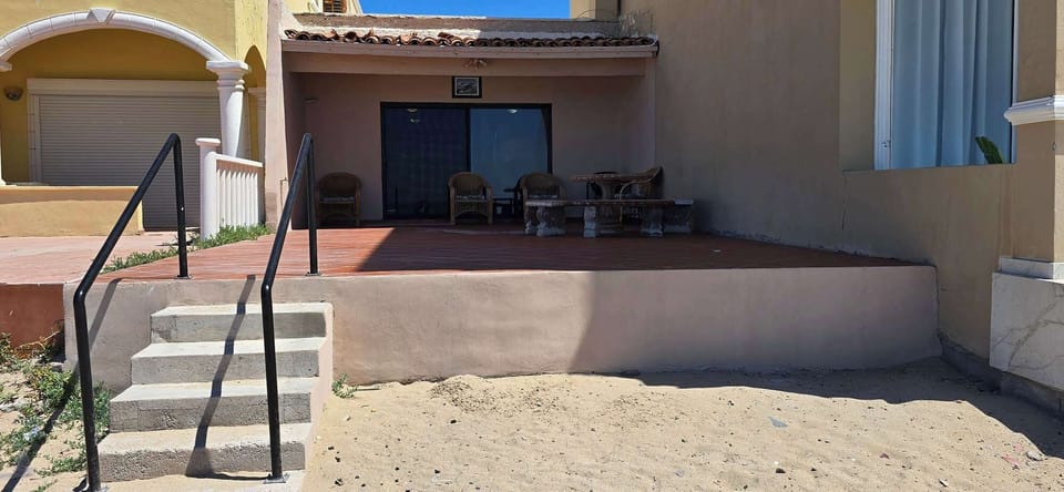 View from the beach , steps with handrails