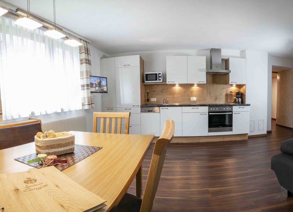 Deluxe Apartment, 1 Bedroom, Mountain View, Garden Area | Living area | 49-cm flat-screen TV with cable channels, TV