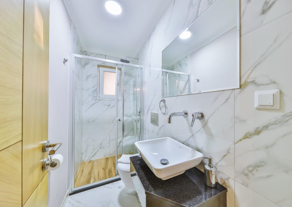 Double Room | Bathroom | Shower, hair dryer, towels, soap