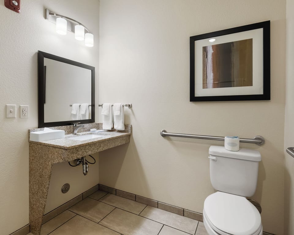 Combined shower/tub, hair dryer, towels, soap