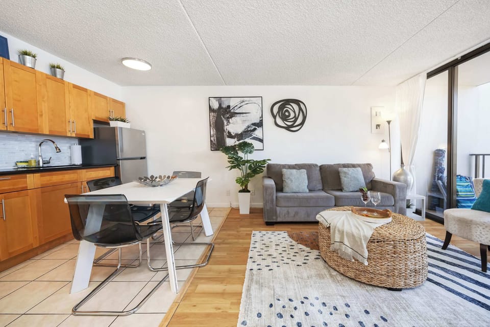 Relax in your living room with a sleeper sofa and a dining area for 4