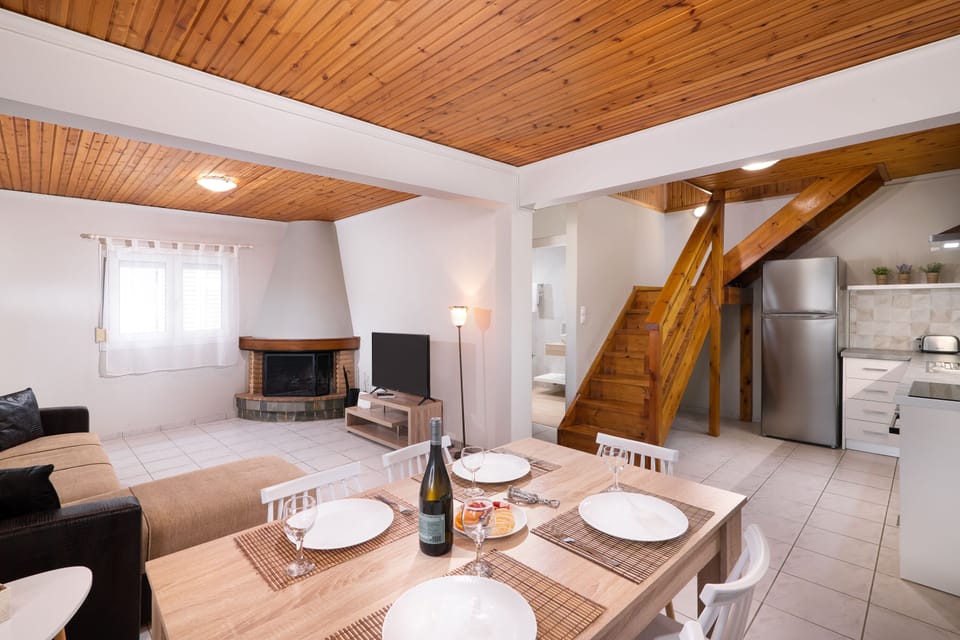 Deluxe House, 3 Bedrooms, Sea View | Living area | Flat-screen TV, fireplace