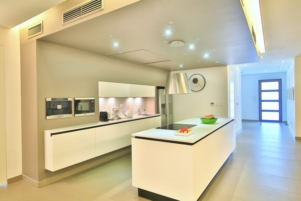 Luxury Condo, 3 Bedrooms | Private kitchen | Coffee/tea maker, full-size fridge, microwave, oven