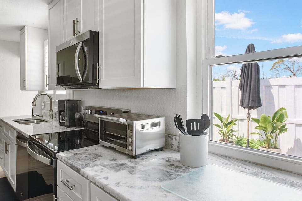 Brand new kitchen and bathroom counter tops & sinks.