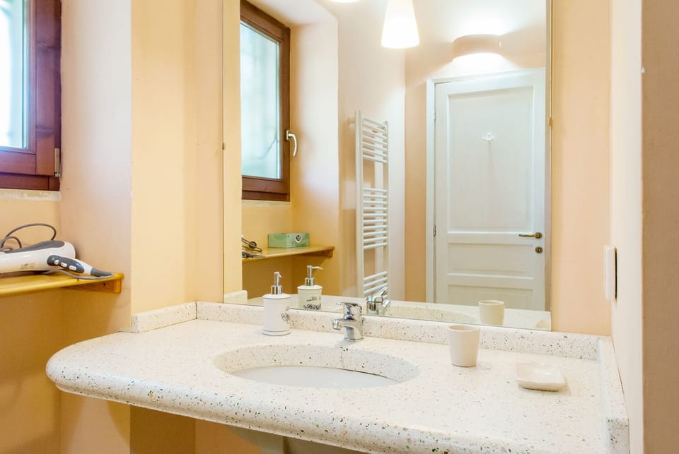 Family Suite, 2 Bedrooms, Garden View | Bathroom | Shower, hair dryer, towels