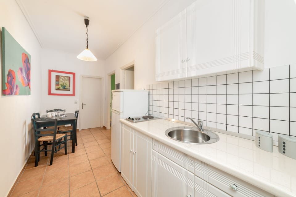 Apartment, 2 Bedrooms | Private kitchen | Coffee/tea maker, fridge, stovetop, electric kettle