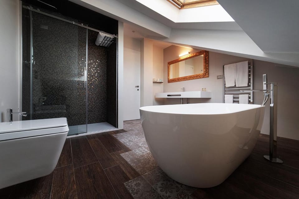 Shower, rainfall showerhead, designer toiletries, hair dryer
