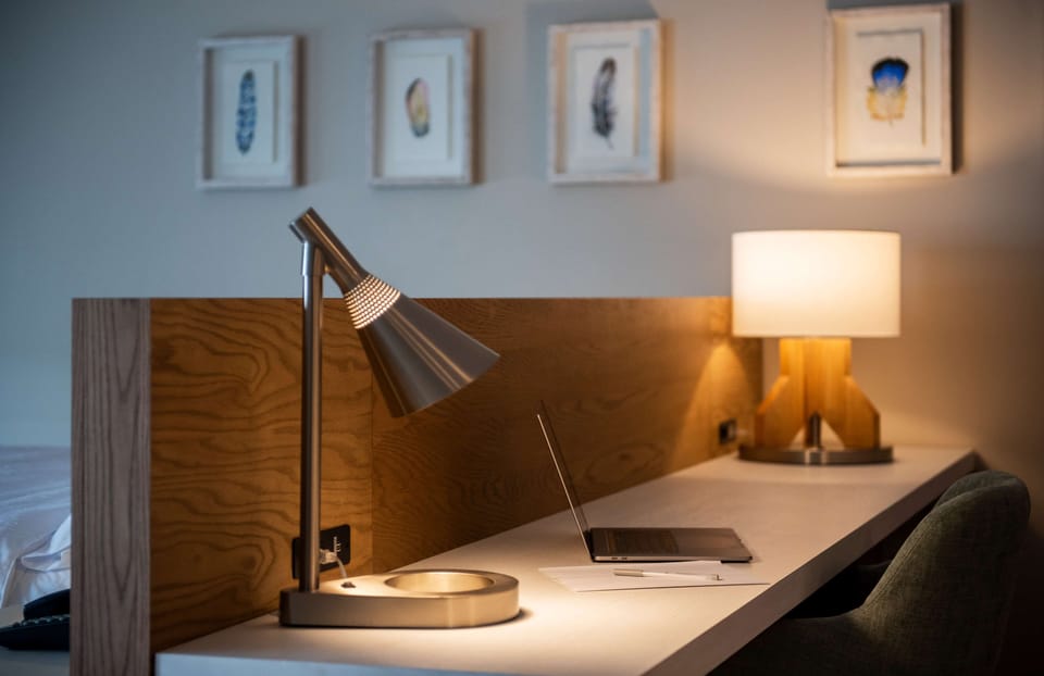 Junior Suite, 1 King Bed | In-room safe, desk, free WiFi, bed sheets