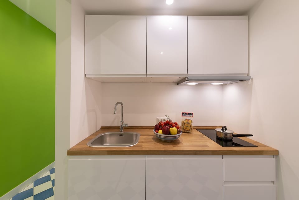 Apartment | Private kitchenette | Fridge, microwave, oven, stovetop