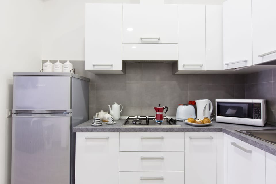 Apartment, 3 Bedrooms | Private kitchen | Dining tables
