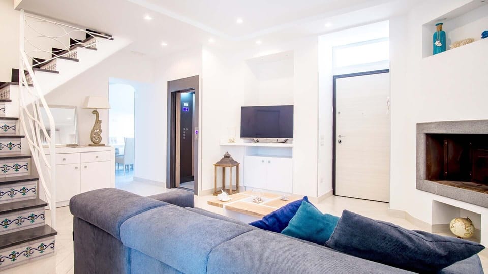 Villa | Living area | 32-inch TV with digital channels