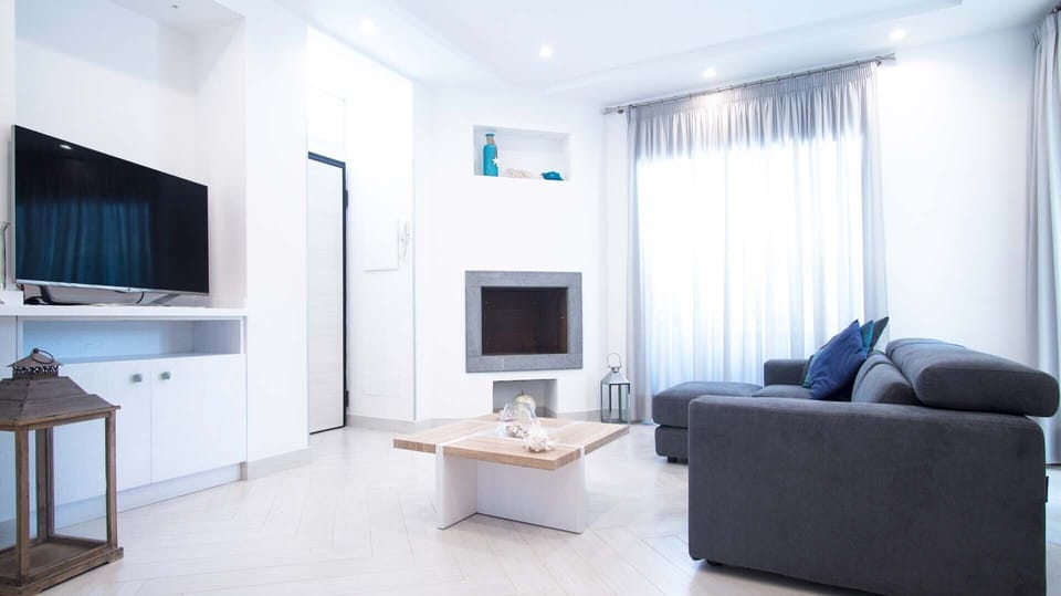 Villa | Living room | 32-inch TV with digital channels