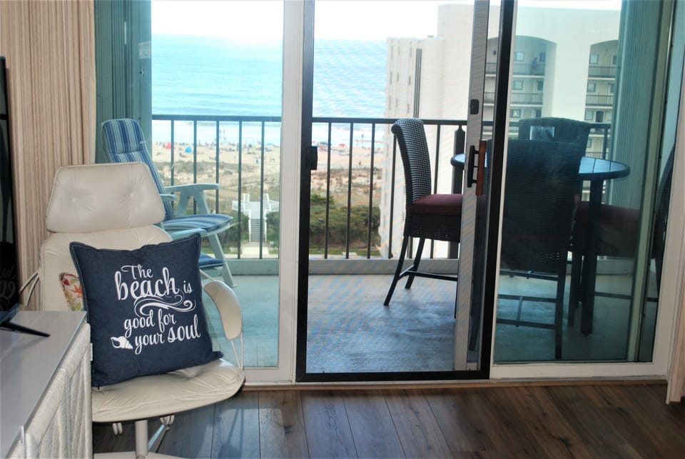 View of the ocean from inside the condo/living room area 