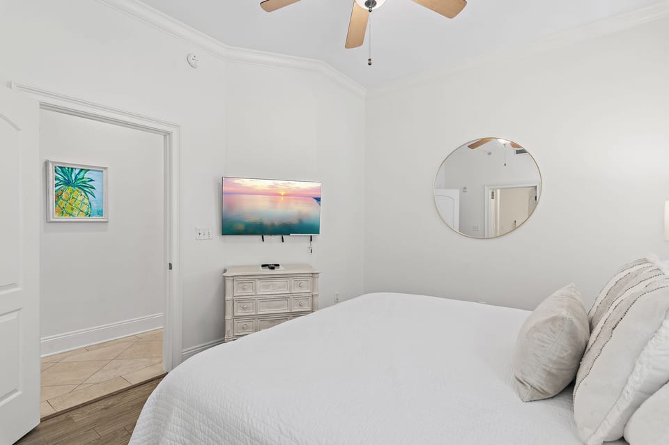 King Bedroom - Enjoy the comfort of a king bed paired with a private ensuite, perfect for a relaxing and stylish retreat.