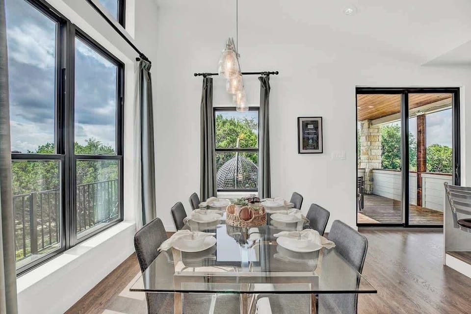 Enjoy a cozy meal with family or friends at this modern dining table that seats six.