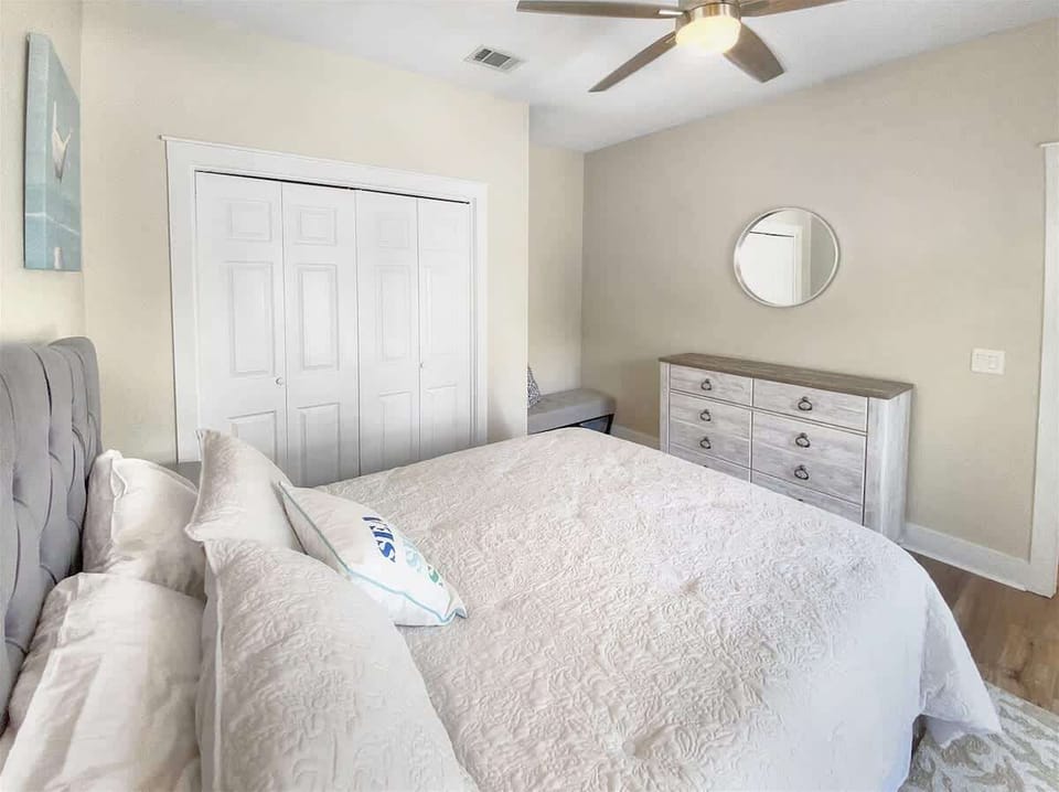 First floor guest bedroom with queen sized bed