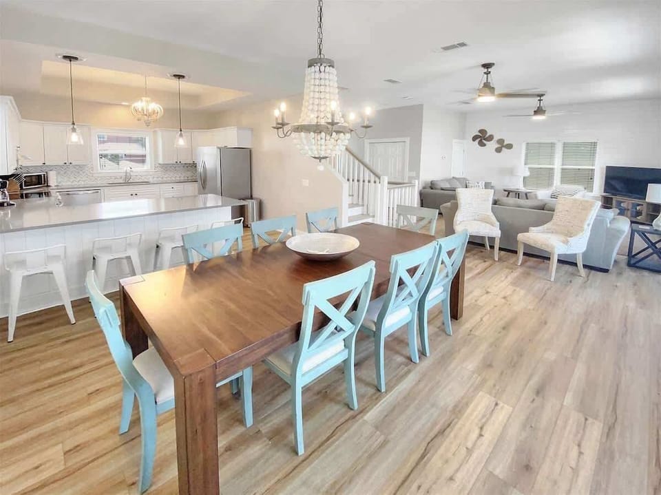 Open floor plan with kitchen, dining and living room