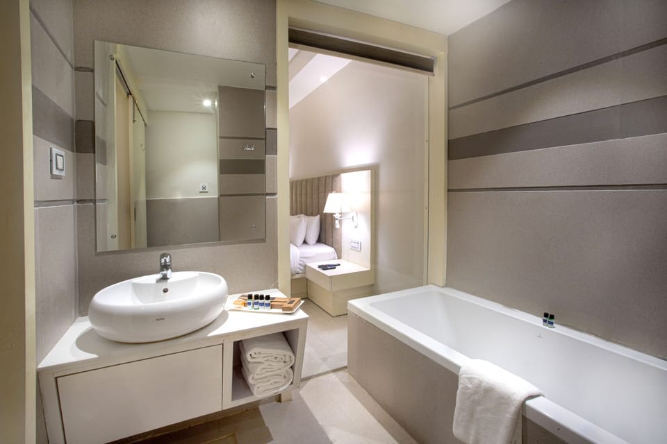 Orbit Club | Bathroom | Free toiletries, slippers, towels
