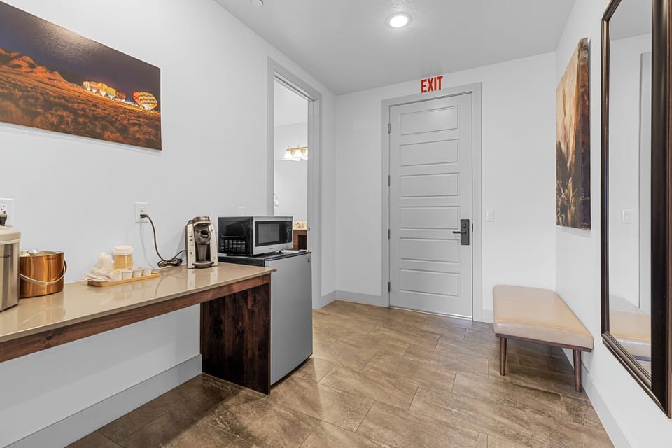 Premium bedding, pillowtop beds, laptop workspace, WiFi (free)