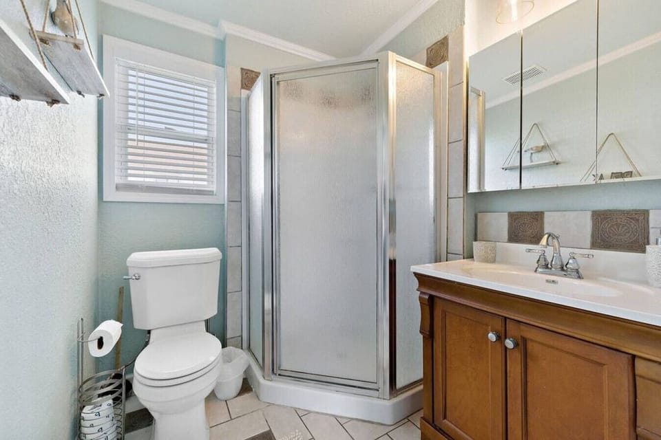 This bathroom is shared by several bedrooms