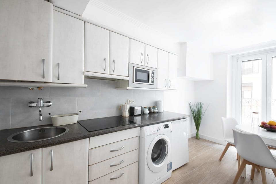 Kitchen and Dining Area with Balcony