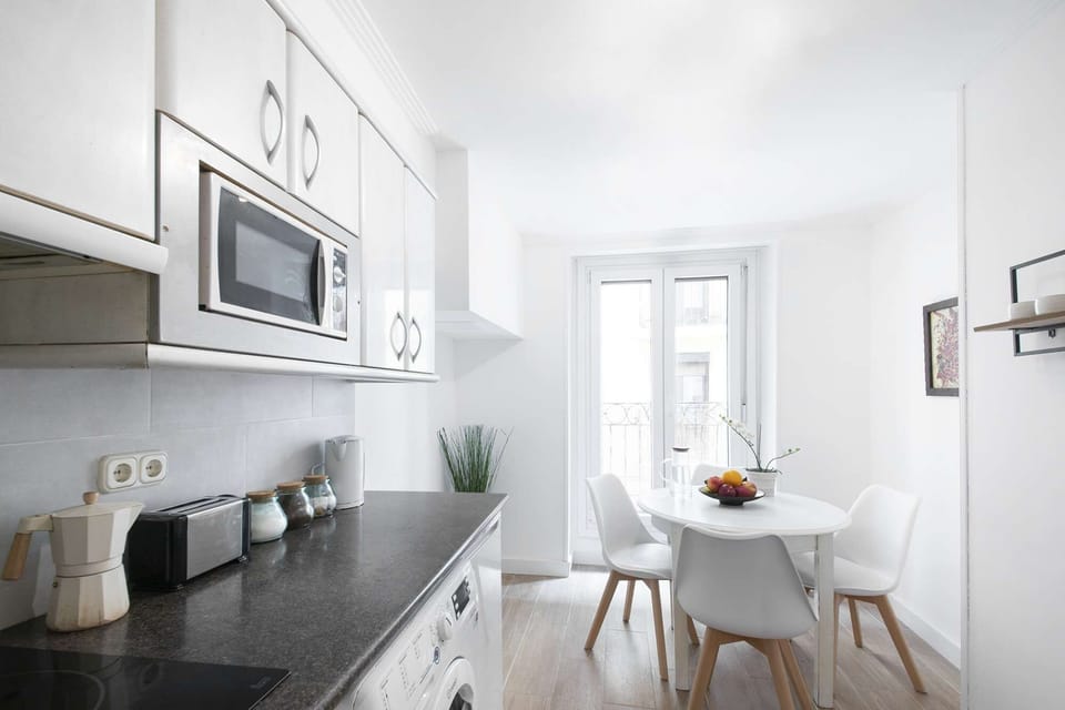 Kitchen and Dining Area with Balcony