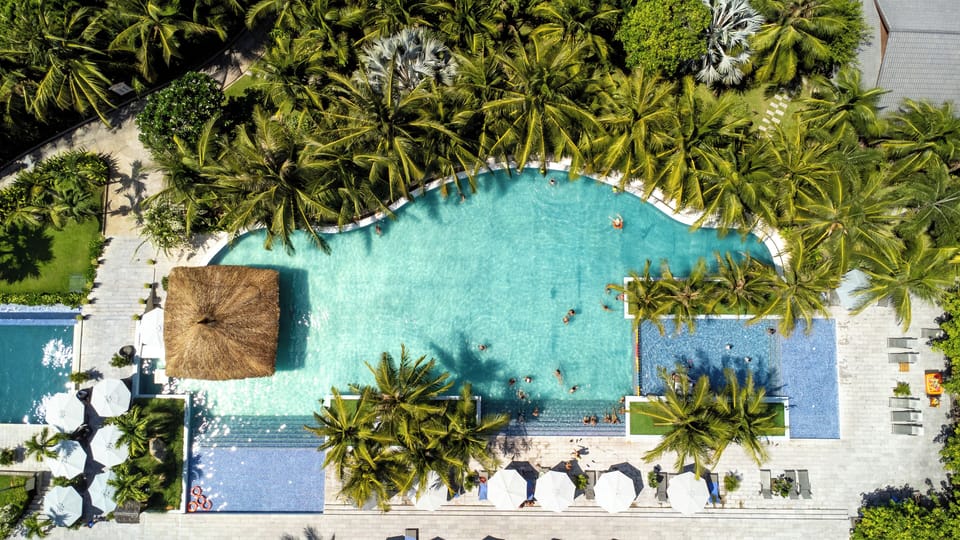 2 outdoor pools, open 6:00 AM to 7:00 AM, pool umbrellas, sun loungers