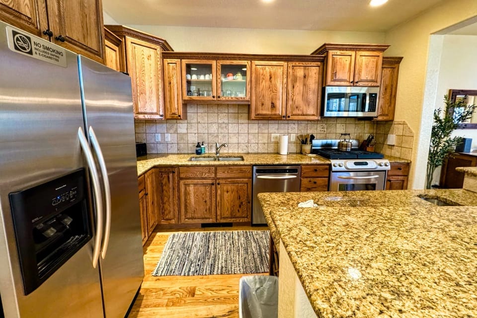 From the stainless appliances to the wide array of cookware, this kitchen has everything you'll need to prepare meals.